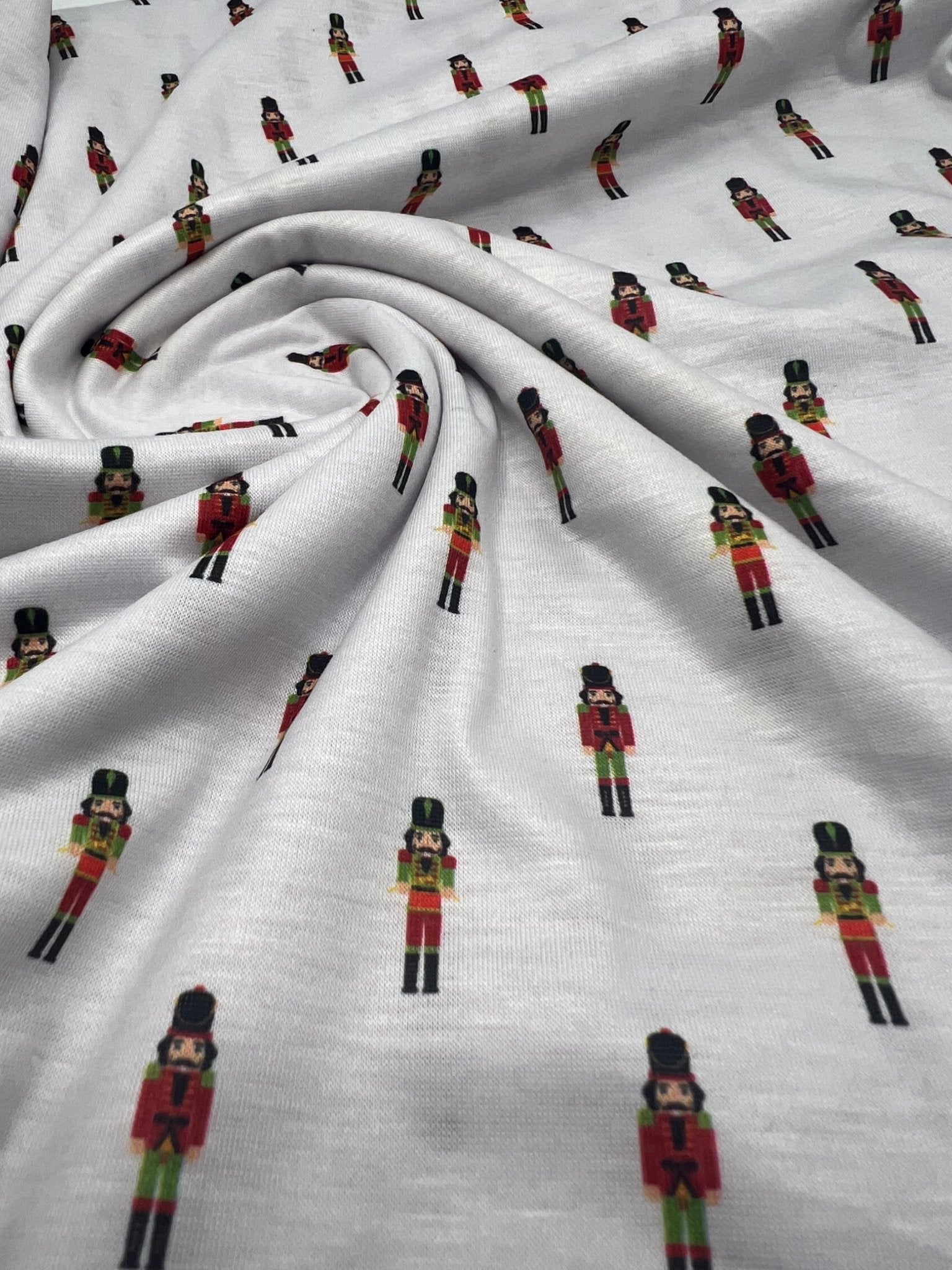 Small Nutcrackers Print Soft Spun Poly Stretch Fabric - T9 Fabrics